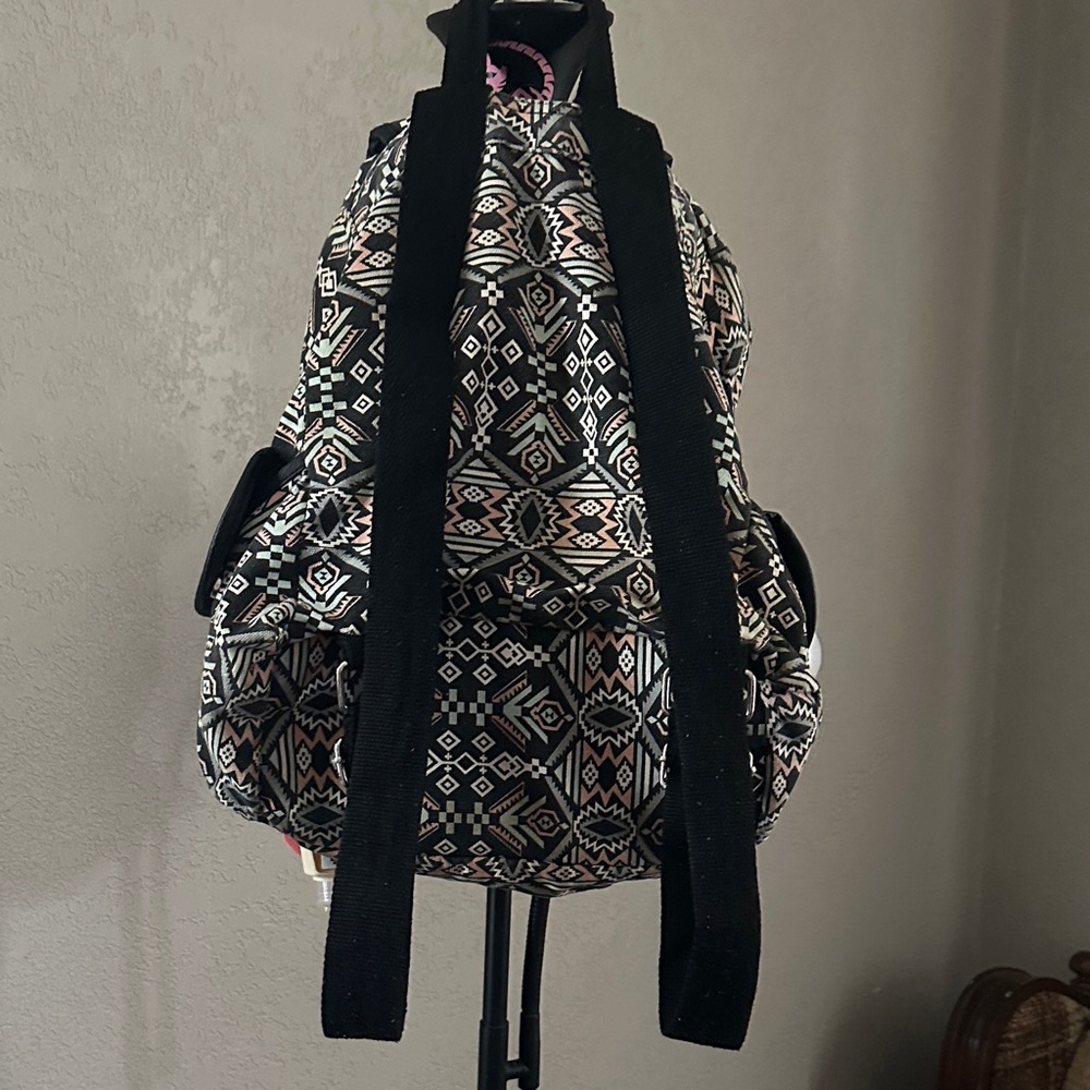 Patterned Backpack With Black And White Accents - image 3